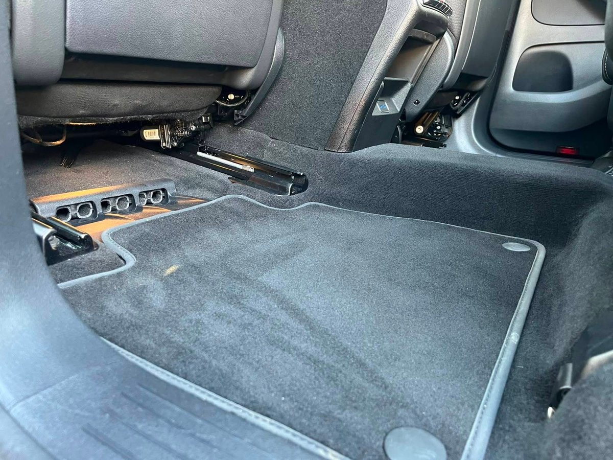 Car boot and carpets vacuumed during a full interior valet
